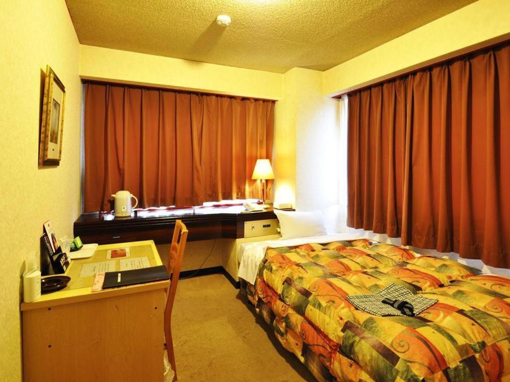 Business Hotel Atelier Kagoshima Luaran gambar